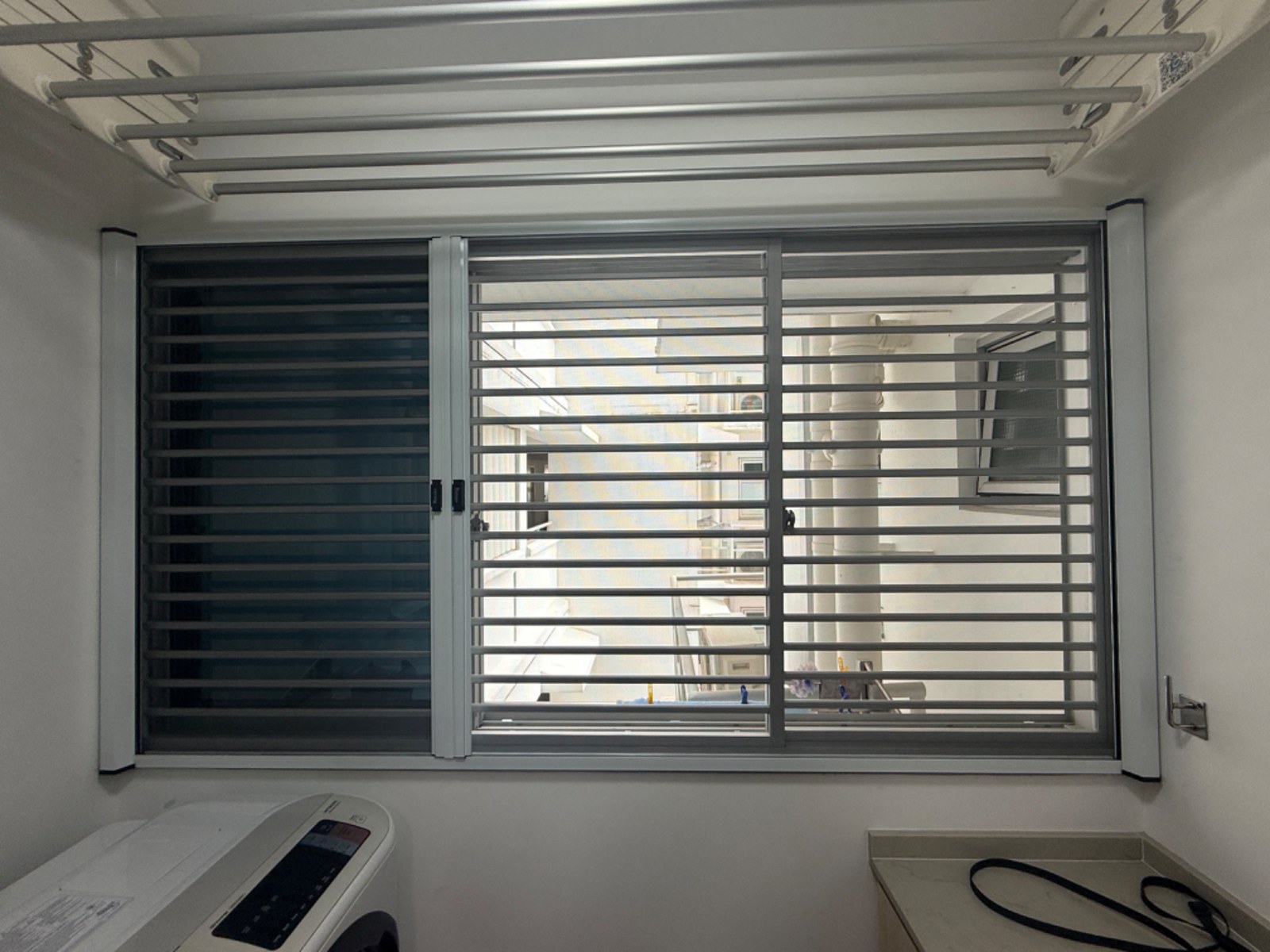 Retractable Insect Mesh installed in a real Singapore home